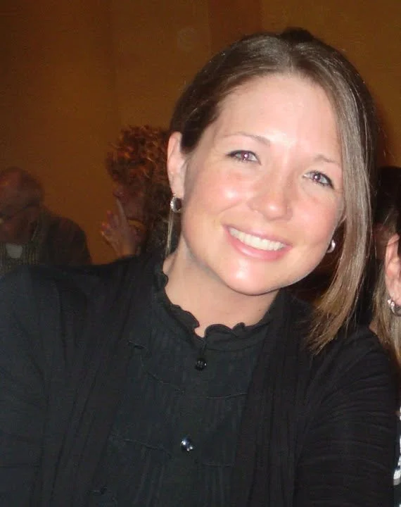 Emily Barrett smiling, a LCSW, Krystle's past supervisor