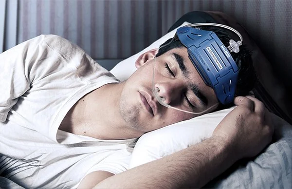 Man using an at home ARES sleep apnea testing device for evaluation at Northwest Ohio Sleep Solutions in Maumee Ohio