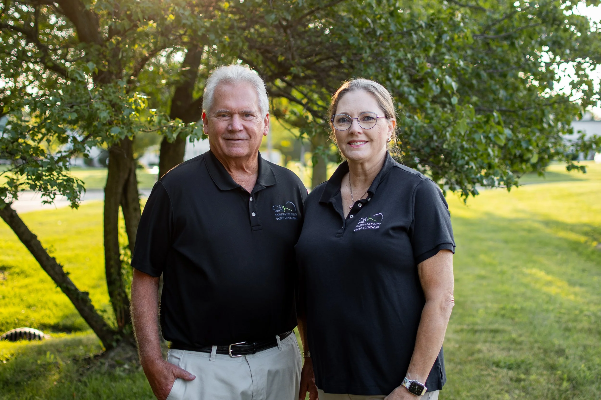 Dr.  Stuckey and the team of Northwest Ohio Sleep Solutions standing together outdoors in Maumee, Ohio