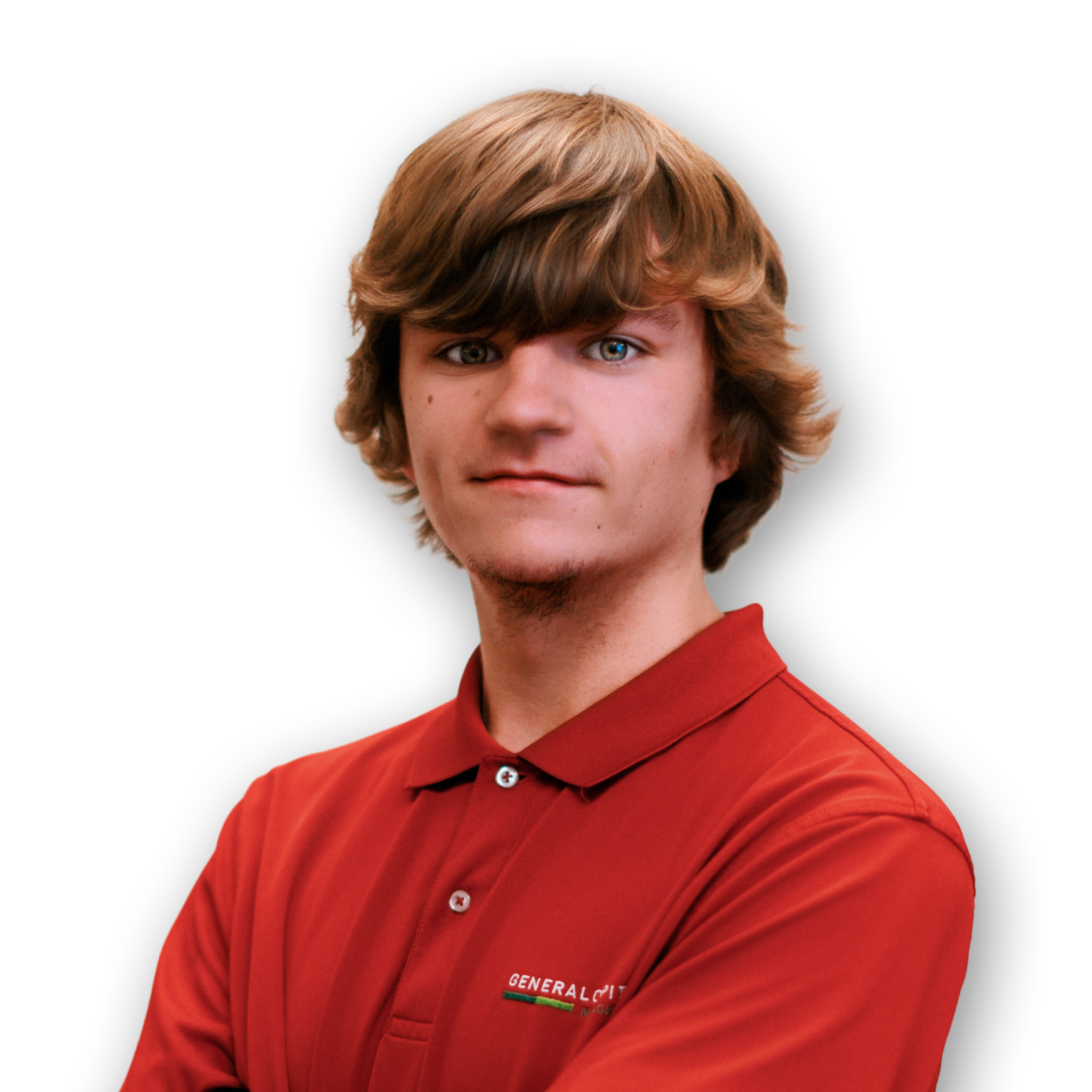 A young man with light reddish-brown hair, blue eyes, and freckles wearing a red collared shirt with an embroidered logo that reads 'GENERAL IT' on the chest, against a black background.