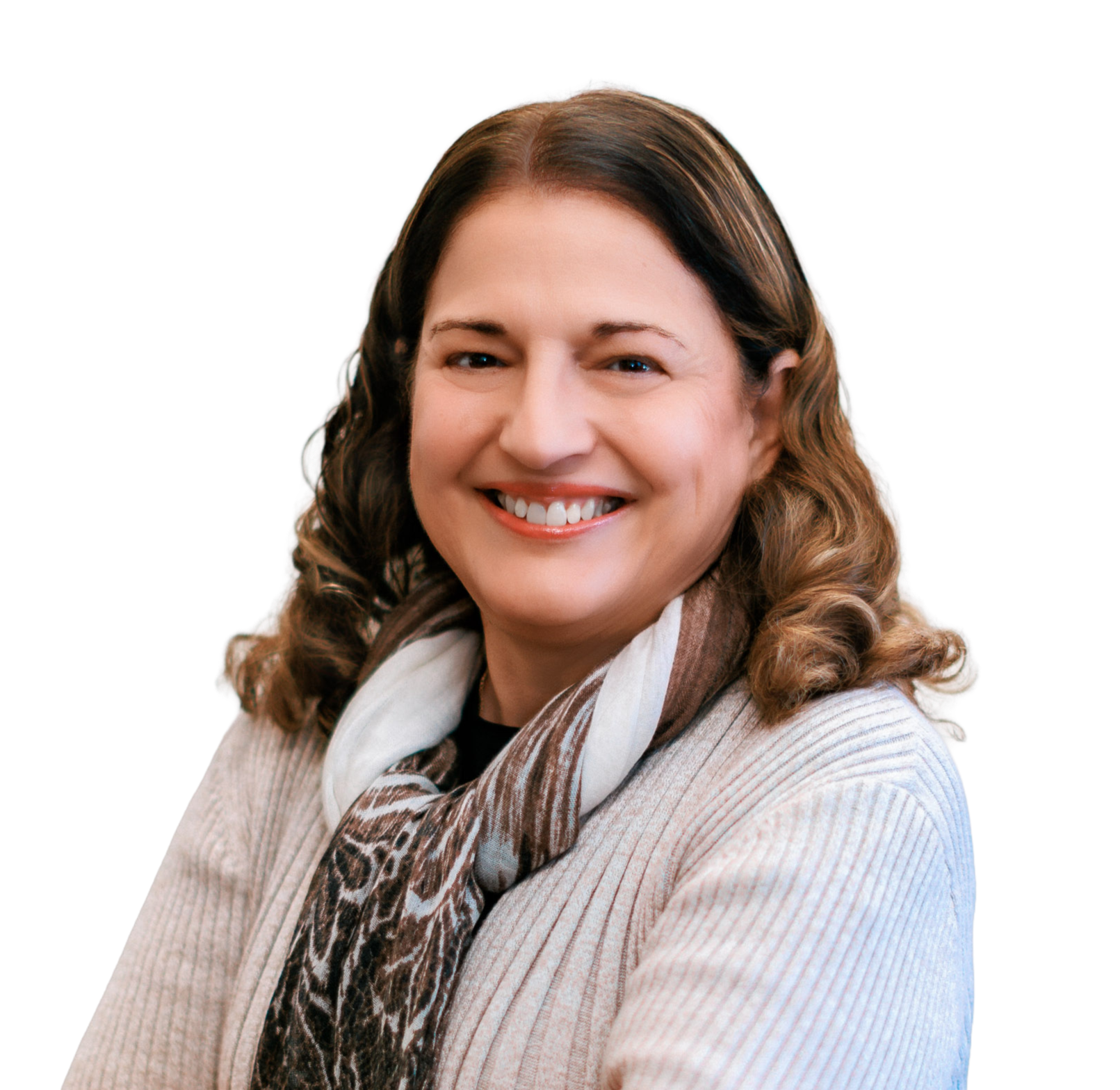 A smiling woman with brown, curly hair wearing a beige striped cardigan and a leopard print scarf over a black top.