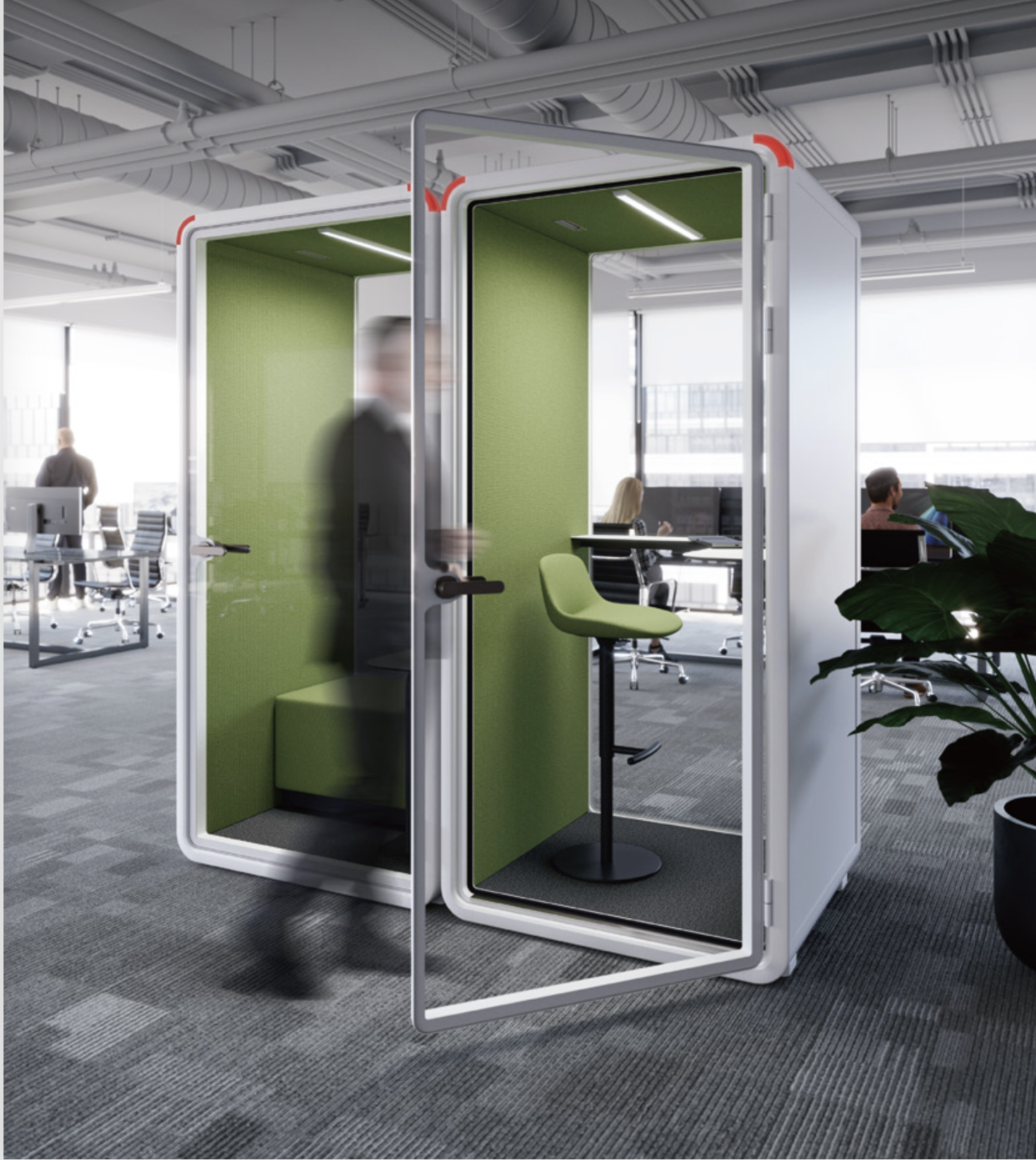 Modern office with a glass-encased meeting pod containing a green swivel chair, with cityscape views and office workers in the background.