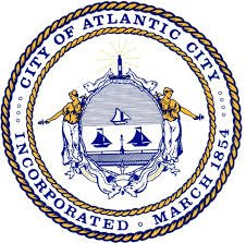 Seal of the City of Atlantic City featuring a shield with ships, ocean waves, and a lighthouse, surrounded by a ribbon with the text 'City of Atlantic City,' 'Incorporated,' and 'March 1854.'