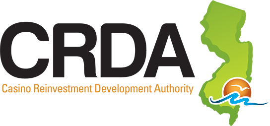 Logo with a green river and orange sunset on the right side.