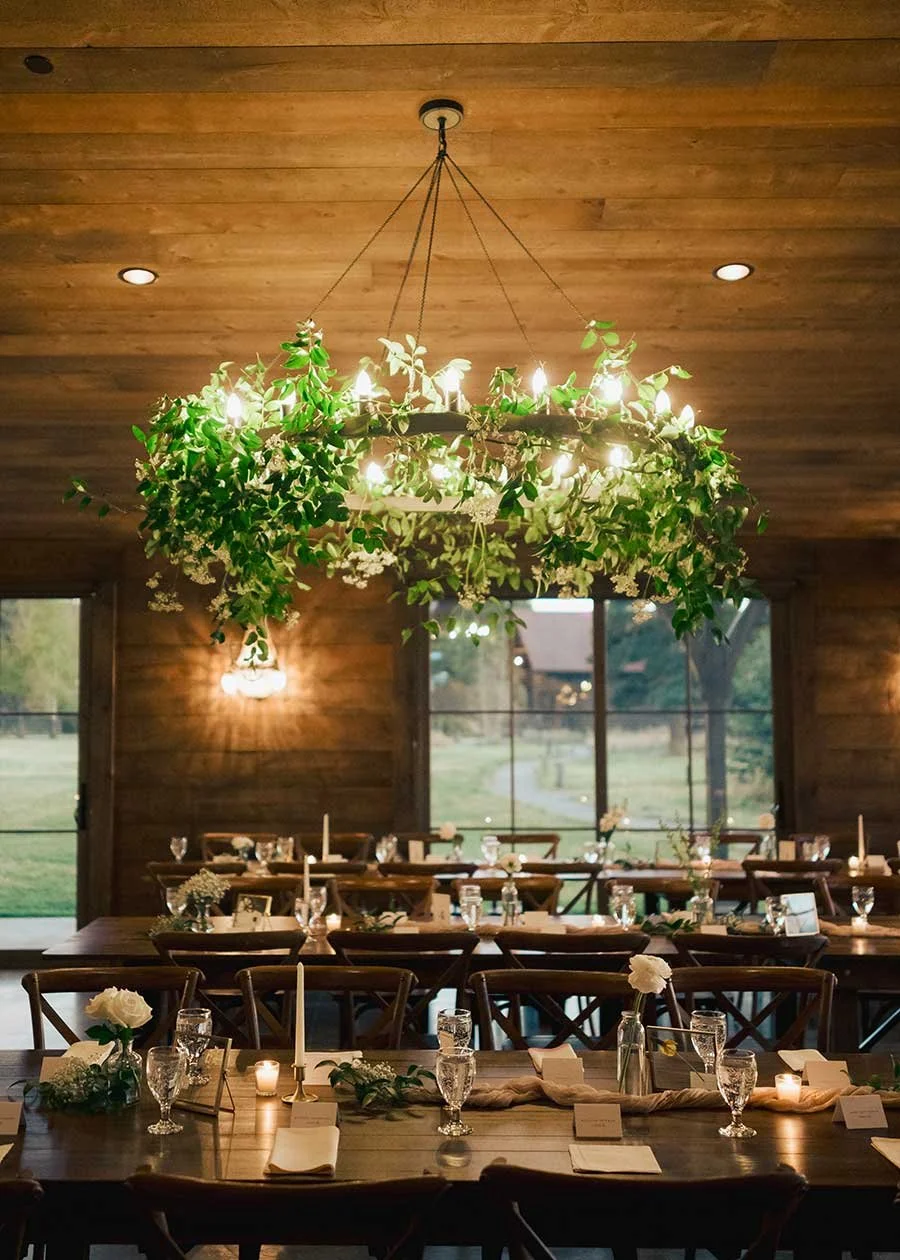 Elegant wedding reception with tables and flowers
