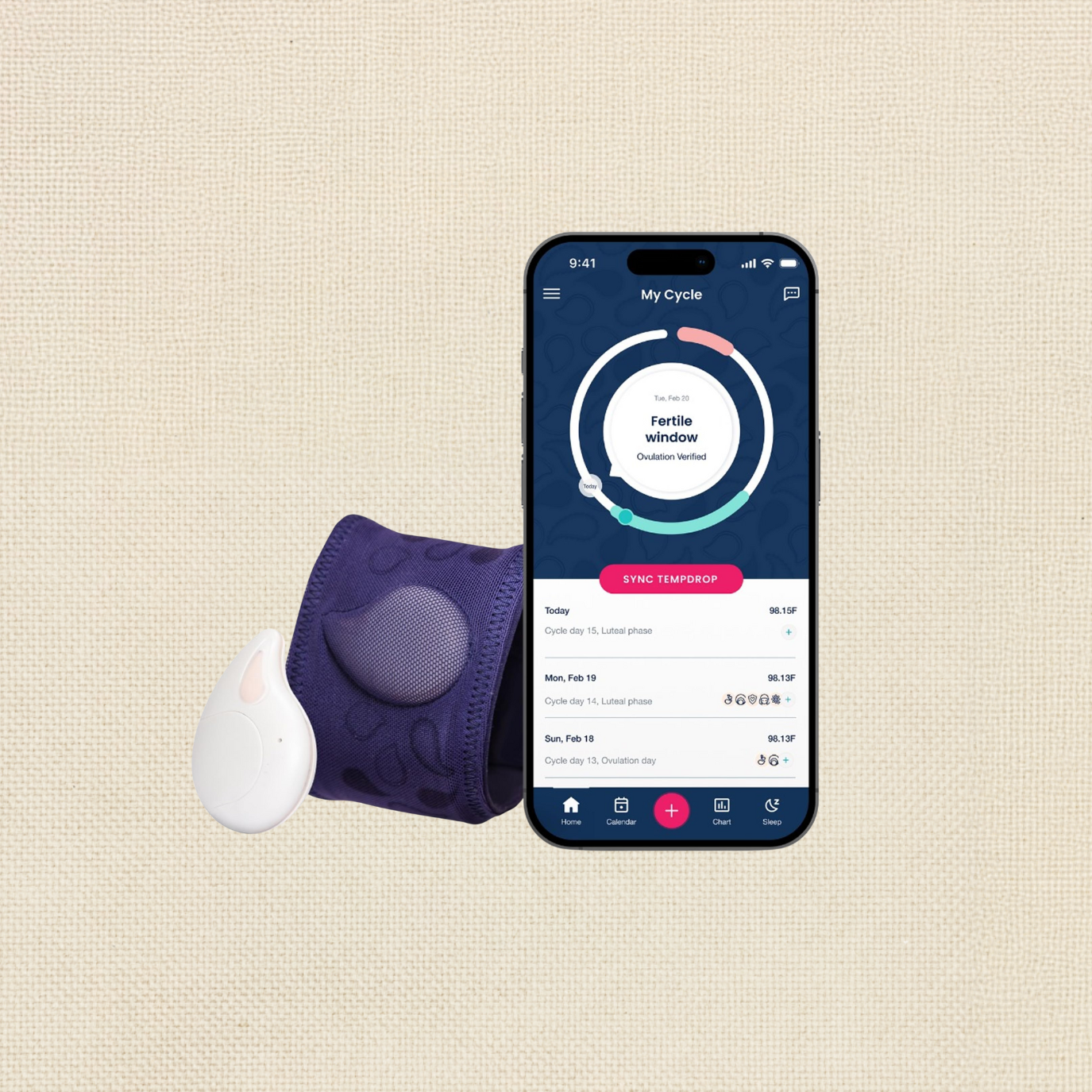 A fertility tracking app on a smartphone screen, a wearable fertility monitor with a purple band, and a white ovulation test device placed on a beige fabric background.