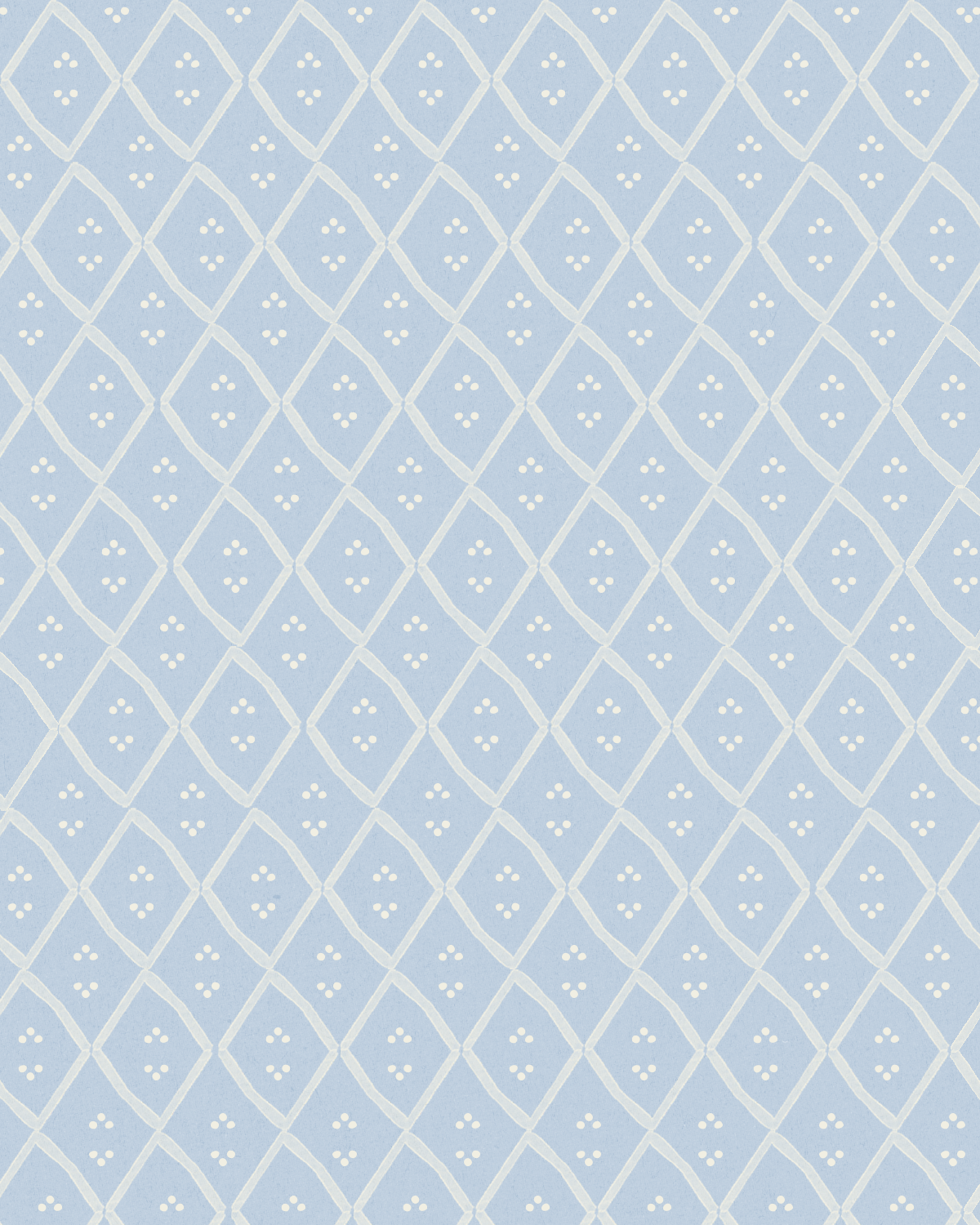 Light blue wallpaper with a white diamond and floral pattern.