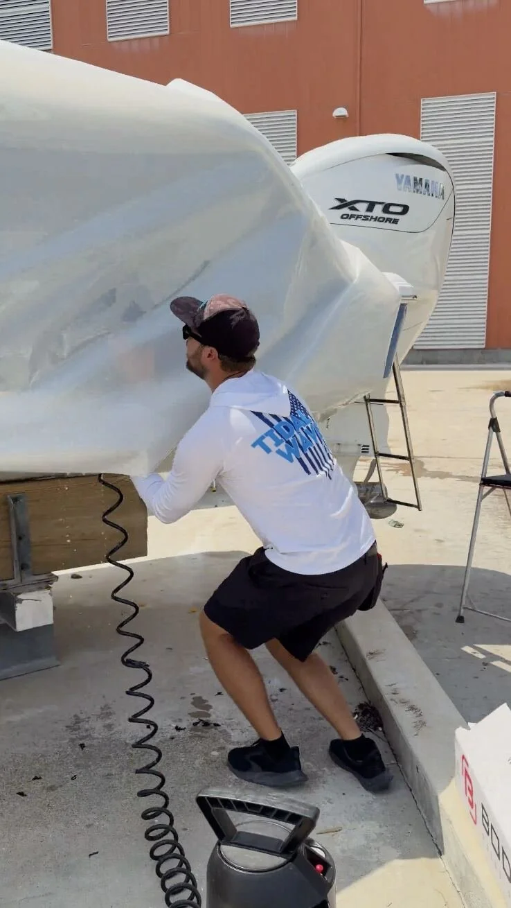 Marine paint protection film application in progress — Tidal Wave Customs