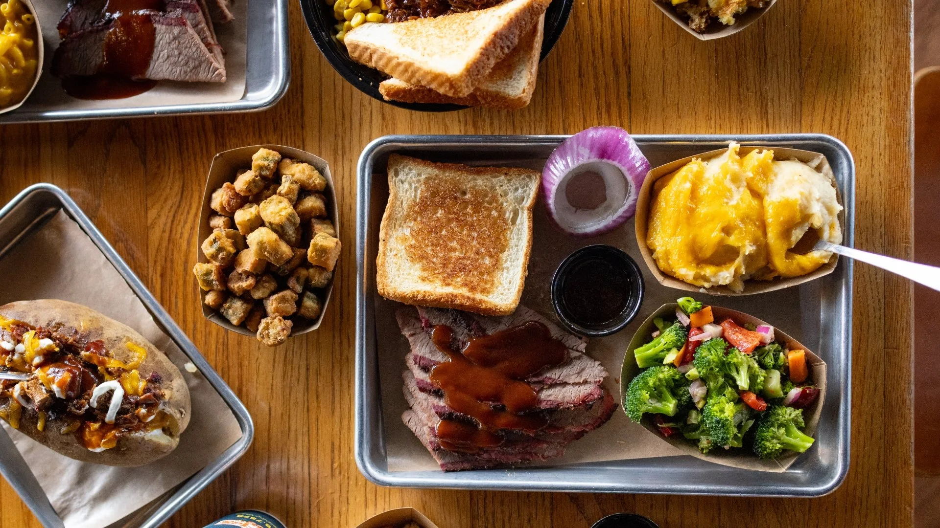 Table with assorted Pok-E-Jo's platters.