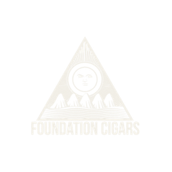 Logo for Foundation Cigars featuring a stylized face of a sun with mountains in the background and the text 'Foundation Cigars' below.
