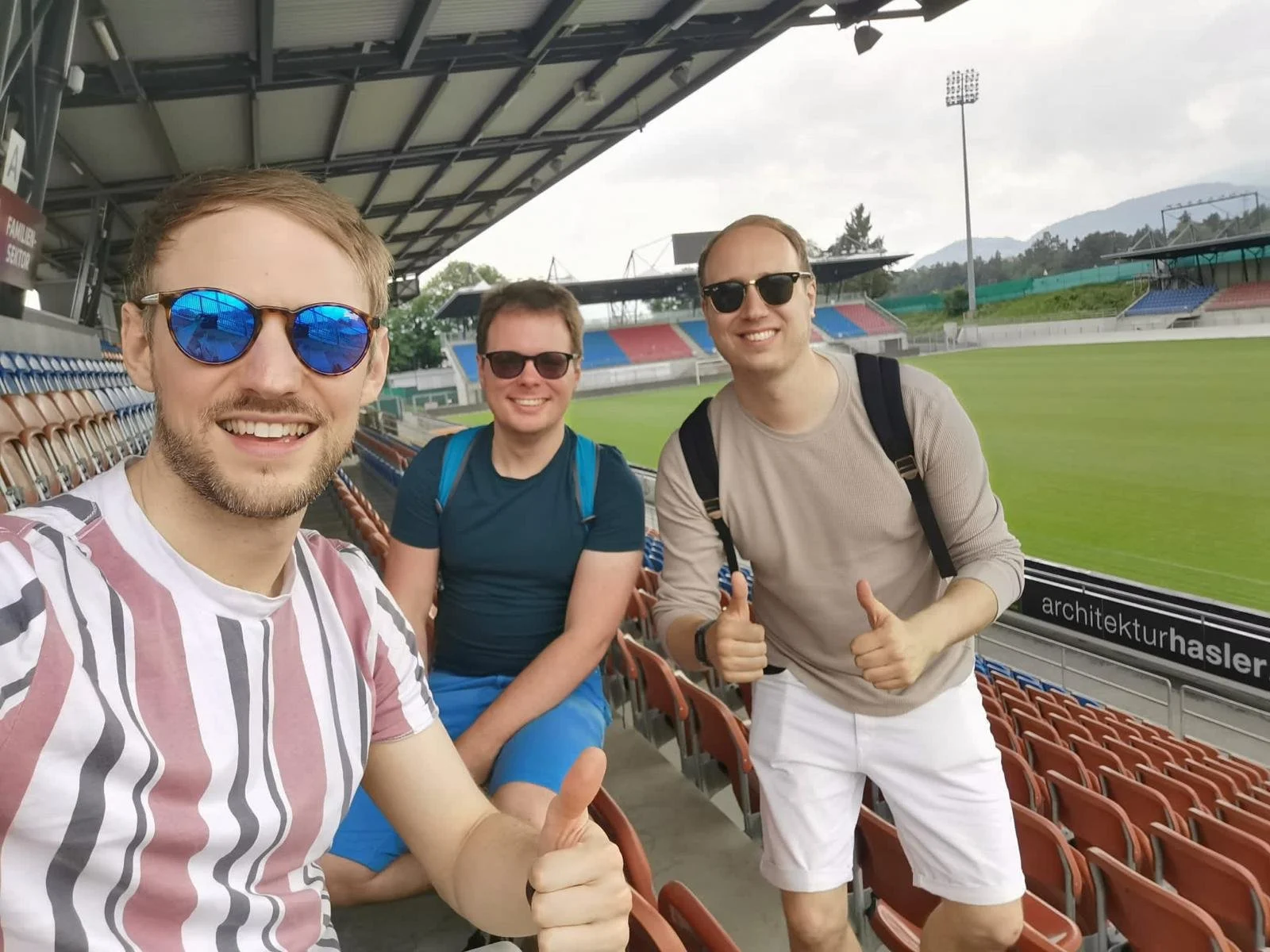 Presenter Lee and Producer Tom with friend of the show Simon at an empty Rheinpark Stadion, which doubles up as FC Vaduz's home ground and the stadium of Liechtenstein's national team.