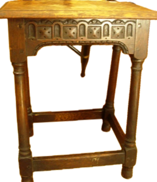 AN ANTIQUE OAK JOINT STOOL, PEGGED AND HAVING A CARVED APRON