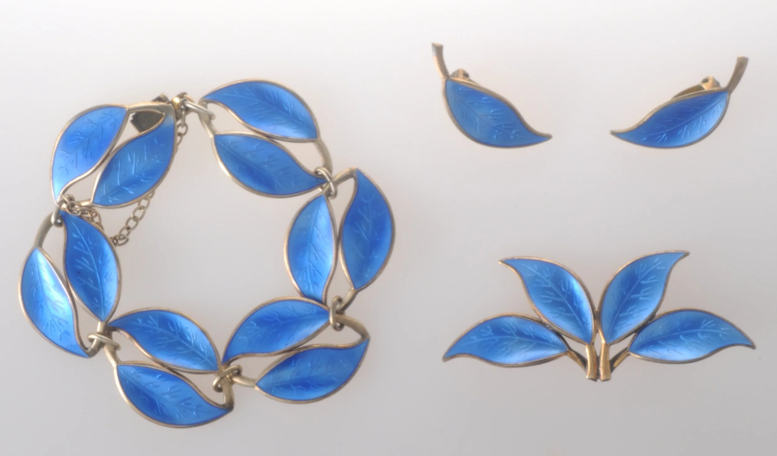 Blue enamel and sterling brooch, bracelet and earring set by David Andersen, Norway.