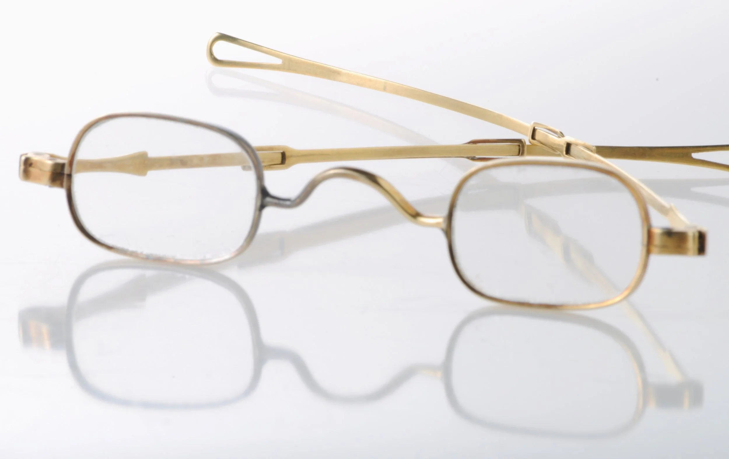 Pair of telescoping eye glasses acid tested to be 14K yellow gold.