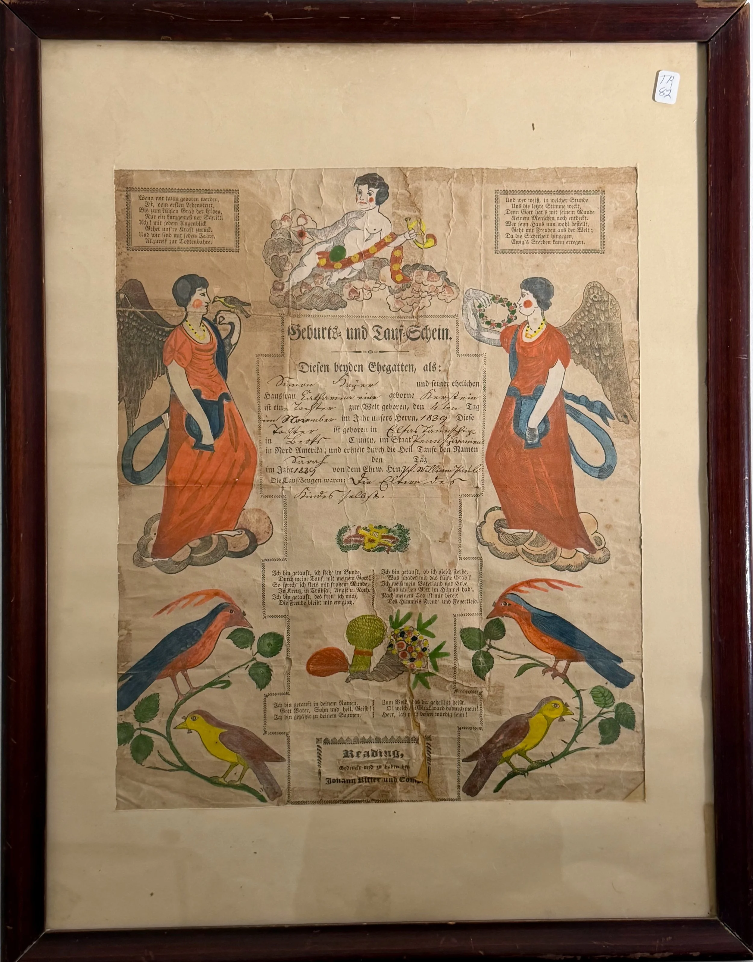 Early 1800's printed birth and baptismal certificate from Reading, Pennsylvania featuring Pennsylvania German Folk Art  hand-colored angels, birds and flowers.