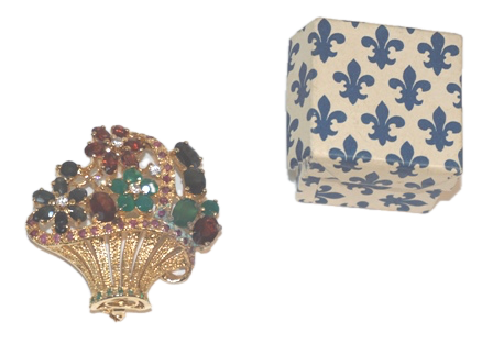 TWO JEWELRY ITEMS: A VINTAGE, GOLD PLATED FLOWER BASKET BROOCH SET WITH REAL RUBIES, SAPPHIRES, GARNETS, EMERALDS, CHRYSOPRASE, AND CZ'S. INCLUDED IS A SMALL BOUQUET BROOCH, GOLD PLATED WITH PASTE STONES IN THE ORIGINAL FRENCH GIFT BOX