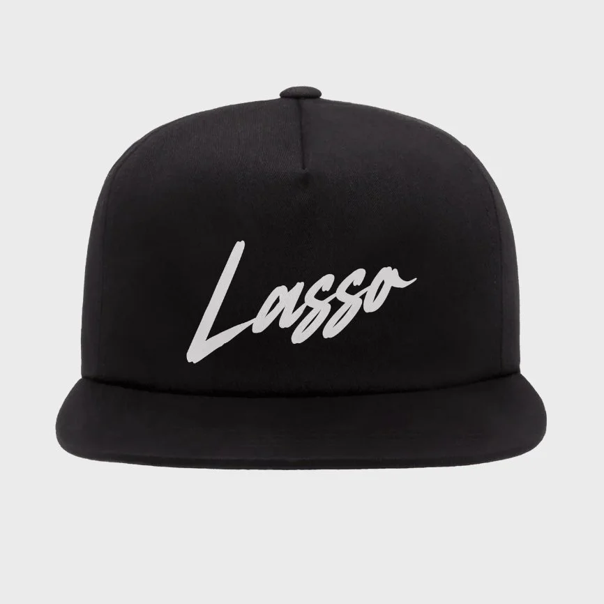 Black trucker hat that says Lasso
