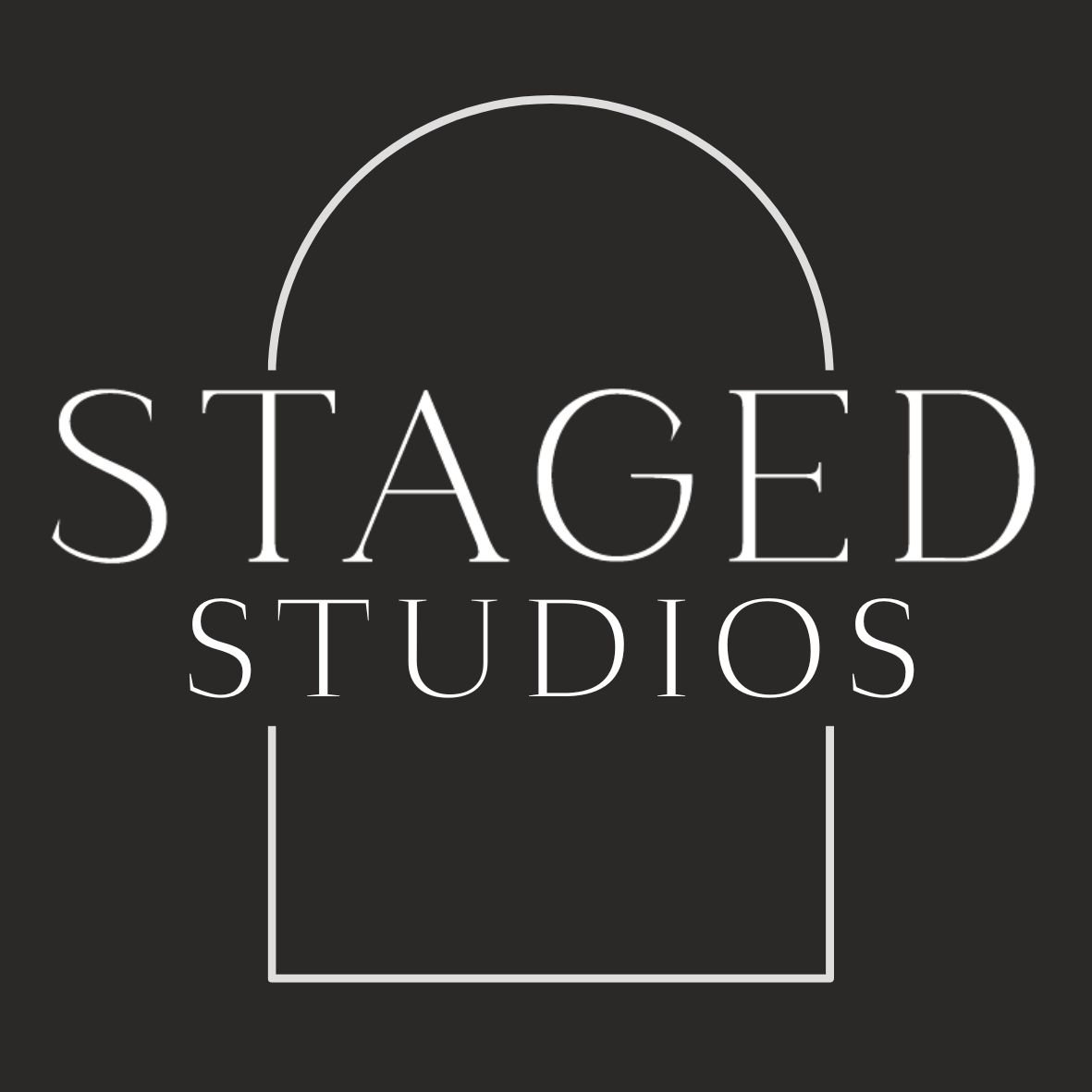 Staged Studios logo with black background, white text, and a minimalist arch design.