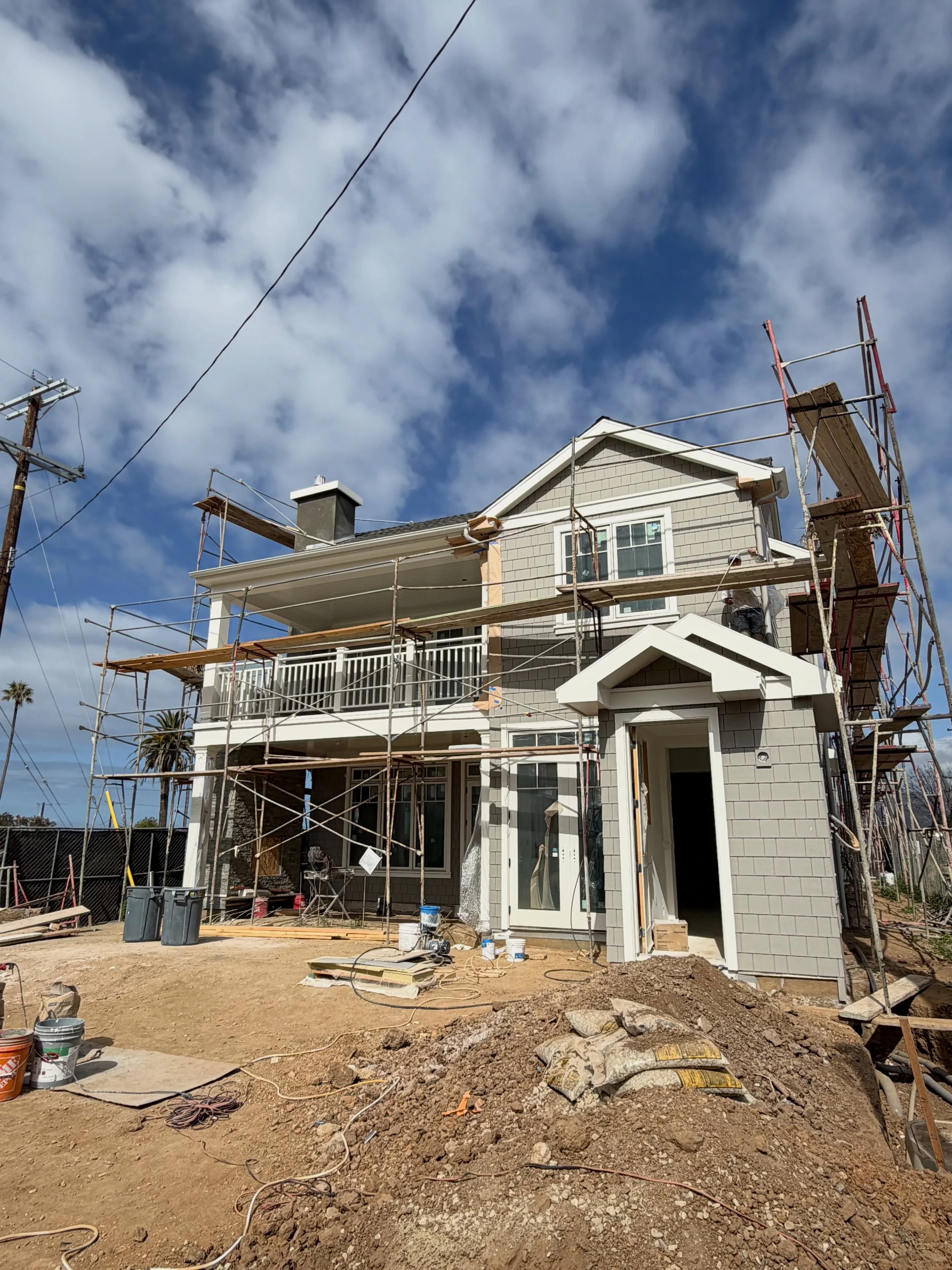 A great finish starts long before the paint goes on.

This new coastal custom home required surface preparation, sanding, patching, masking, and detailed inspections to ensure every exterior surface was ready for a premium finish. From the tongue-and