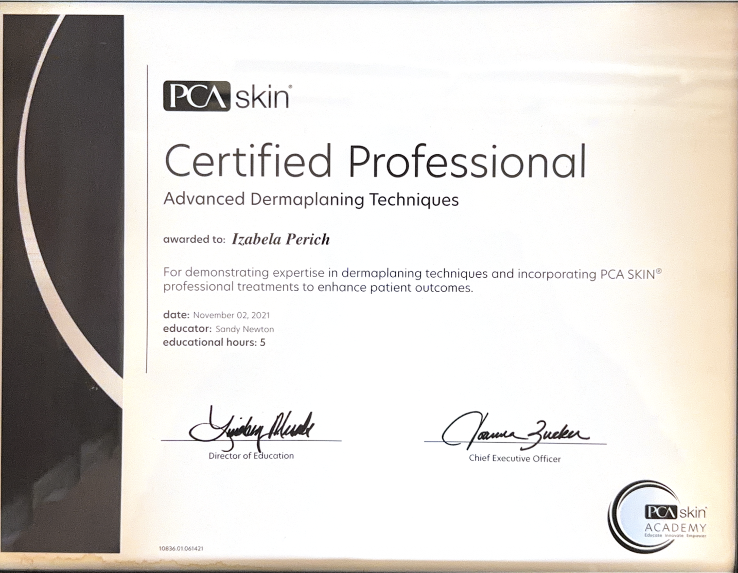 Certificate of completion for advanced dermaplaning techniques awarded to Izabela Perich by PCA Skin Academy on November 2, 2021, signed by Lynn Melick and Joanna Zuckerman, with PCA Skin Academy logo.