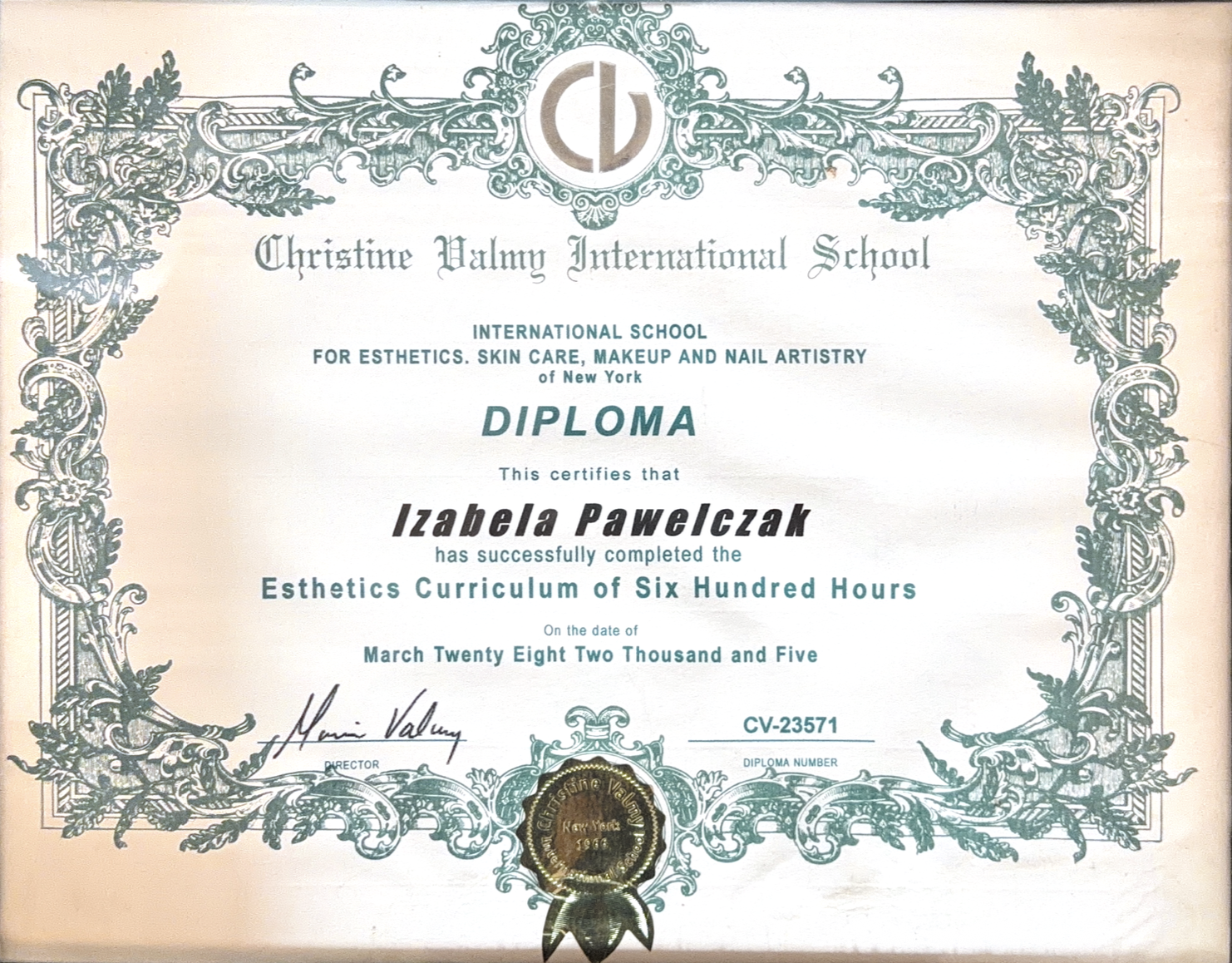 Diploma from Christine Valmy International School awarded to Izabela Pawelczak for completing 600 hours in esthetics curriculum, dated March 28, 2005, with ornate green border and gold seal.