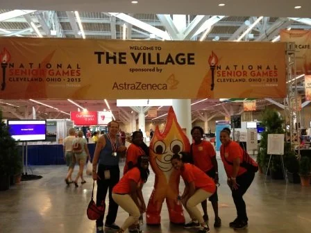 Blaze at the village with volunteers - comp.JPG