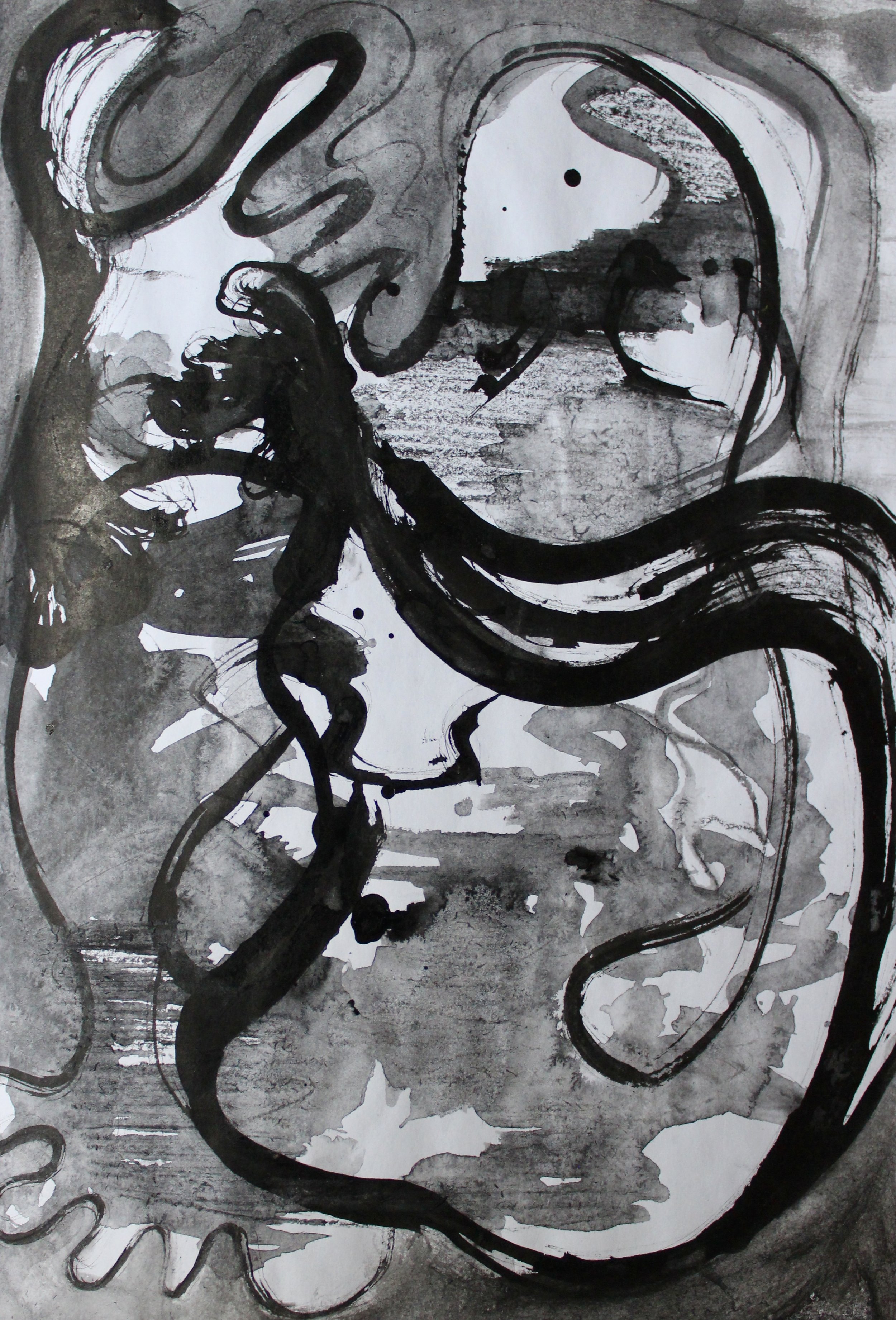 Abstract black ink painting on paper, featuring flowing lines, splashes, and smudges in shades of black and gray.