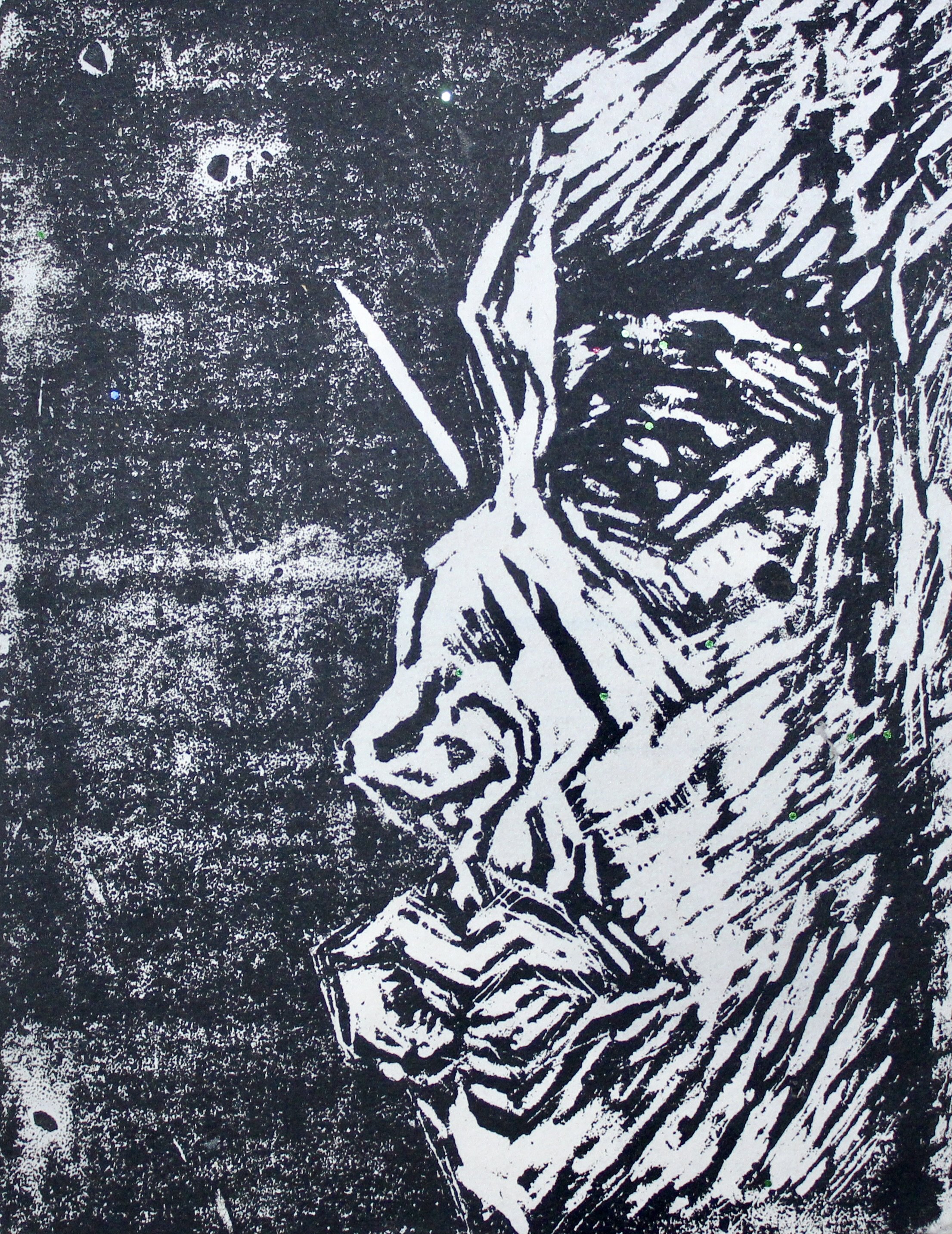 A black and white linocut print of a person with short hair, likely a woman, with their arms crossed and head resting on their forearms, sitting on a surface with a textured background.