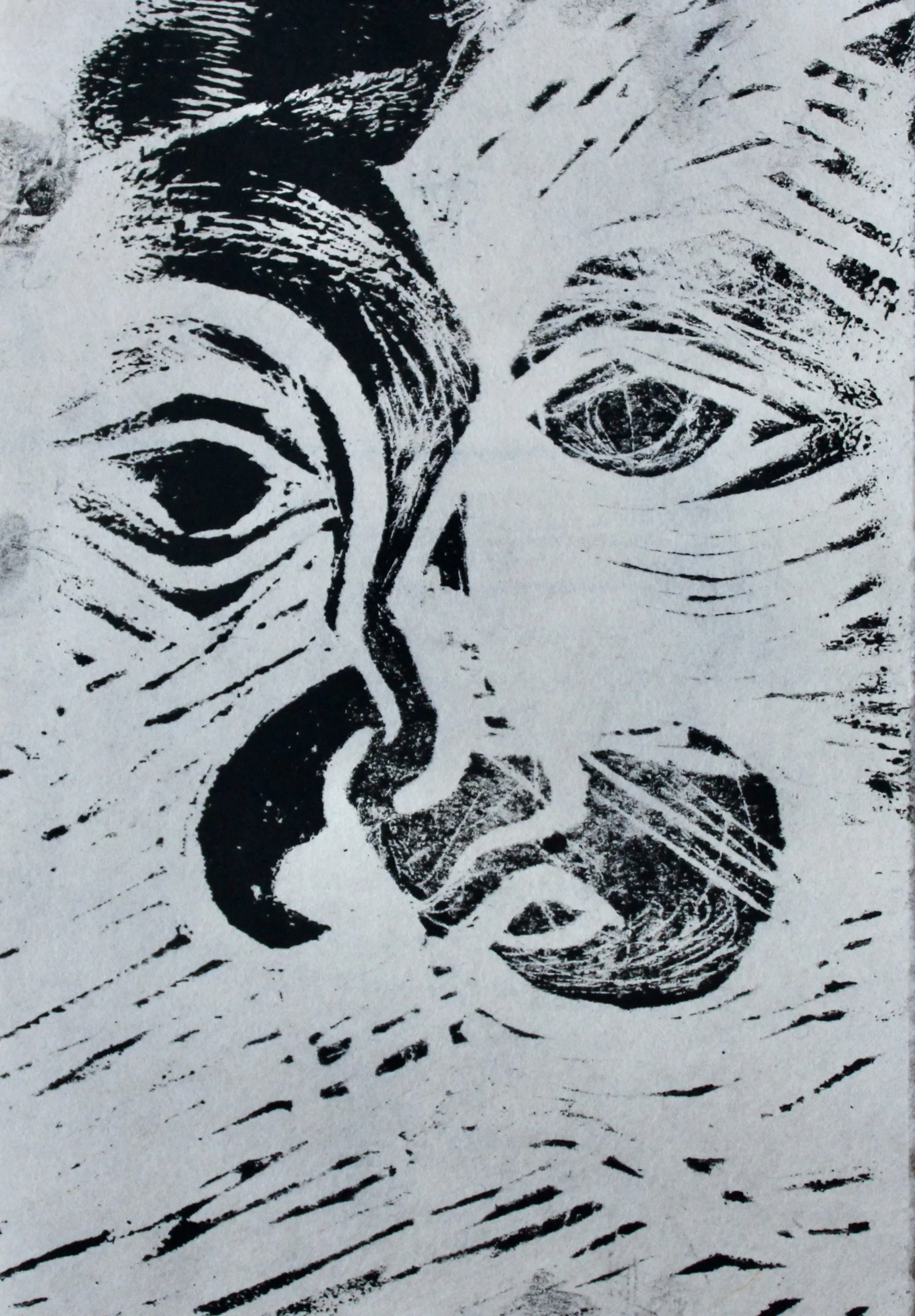 Black and white print of a face with abstract, textured lines, showing one eye, a nose, and lips.