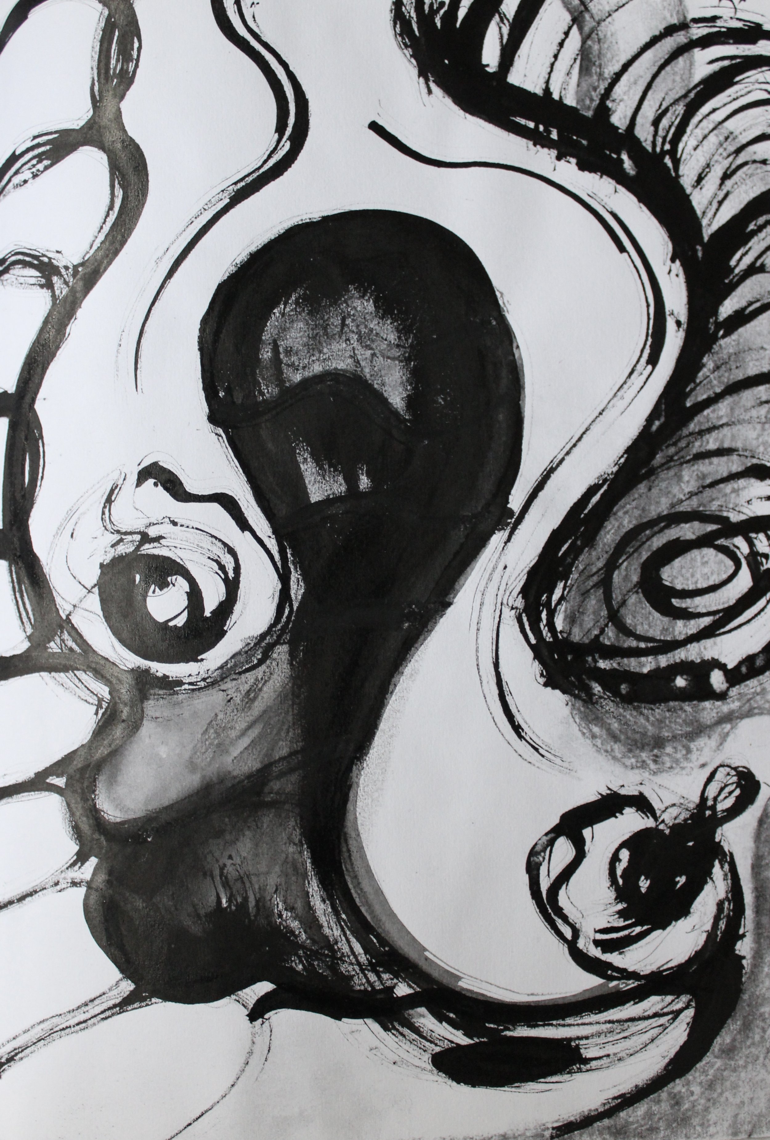 Abstract black and white ink drawing with swirling lines and shapes, featuring a large, dark, rounded central shape resembling a face or figure, surrounded by spiral and curved patterns.