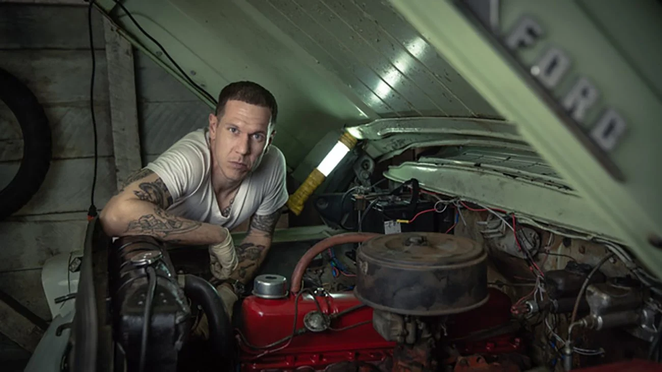 Lifestyle portrait of Luke in his San Francisco Mission District garage — editorial character portrait by Marc Olivier Le Blanc