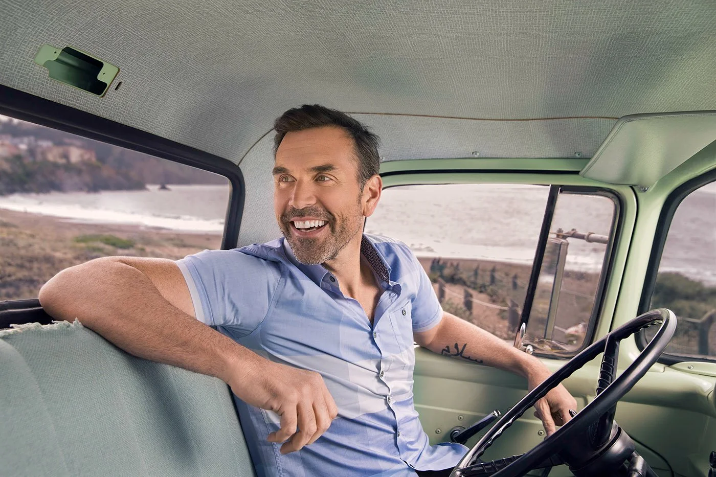 On-location lifestyle shoot at Baker Beach in the Presidio, San Francisco, with Golden Gate Bridge views, by photographer Marc Olivier Le Blanc