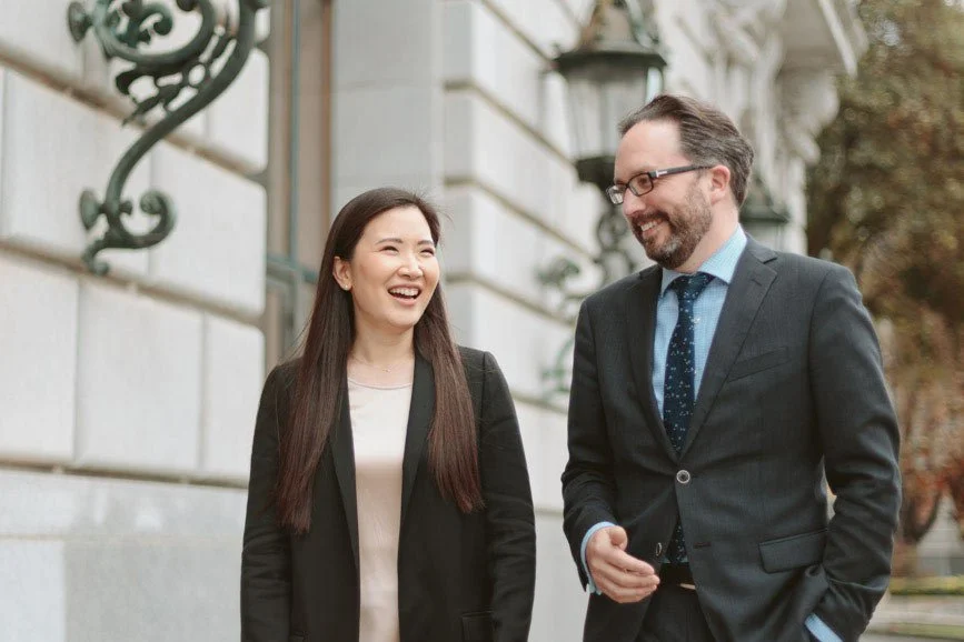 San Francisco Opera Music Director Eun Sun Kim and General Director Matthew Shilvock outside the War Memorial Opera House — photo by Marc Olivier Le Blanc for SFCV