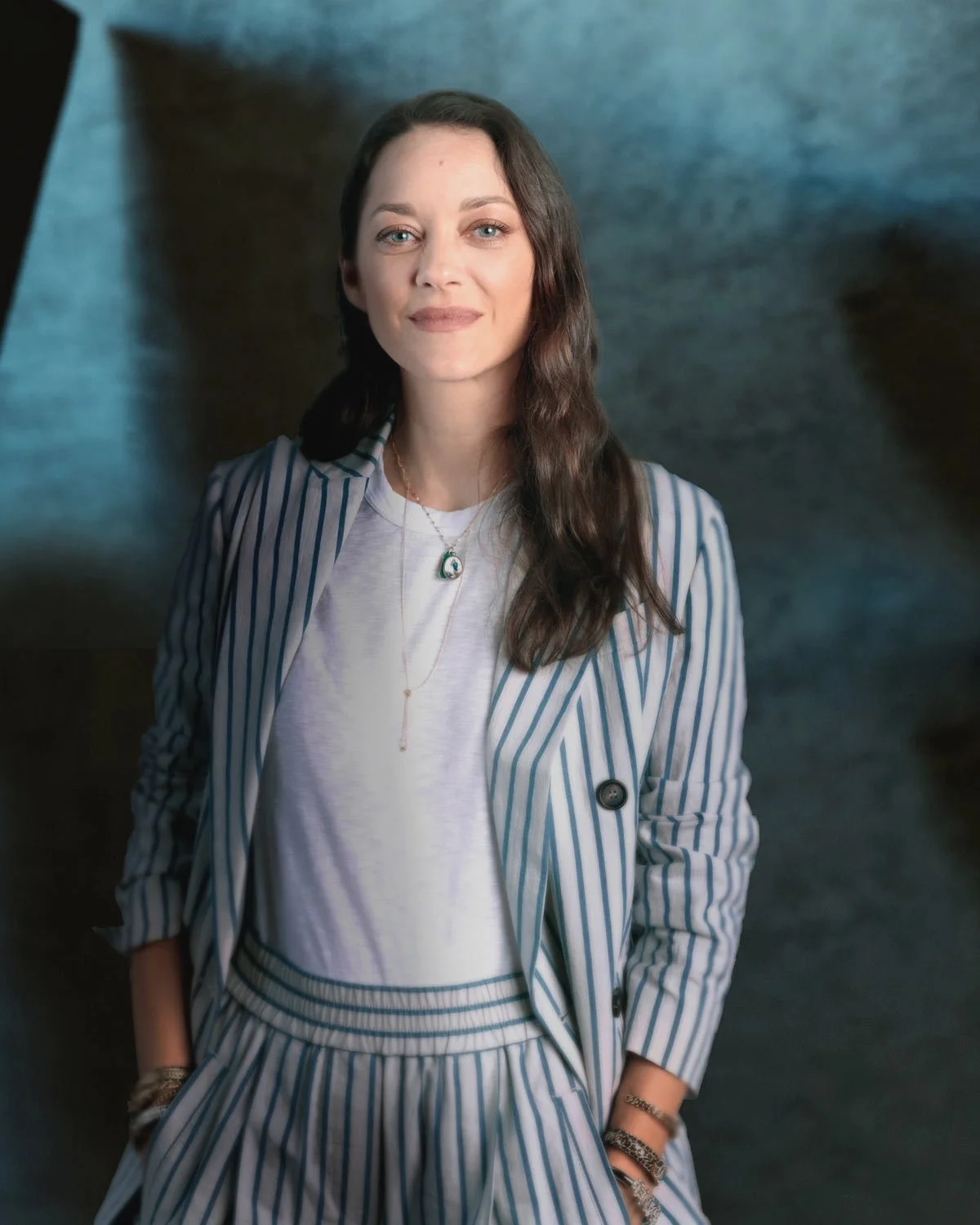 Color portrait of Marion Cotillard against a textured backdrop — commercial photographer Marc Olivier Le Blanc, SF