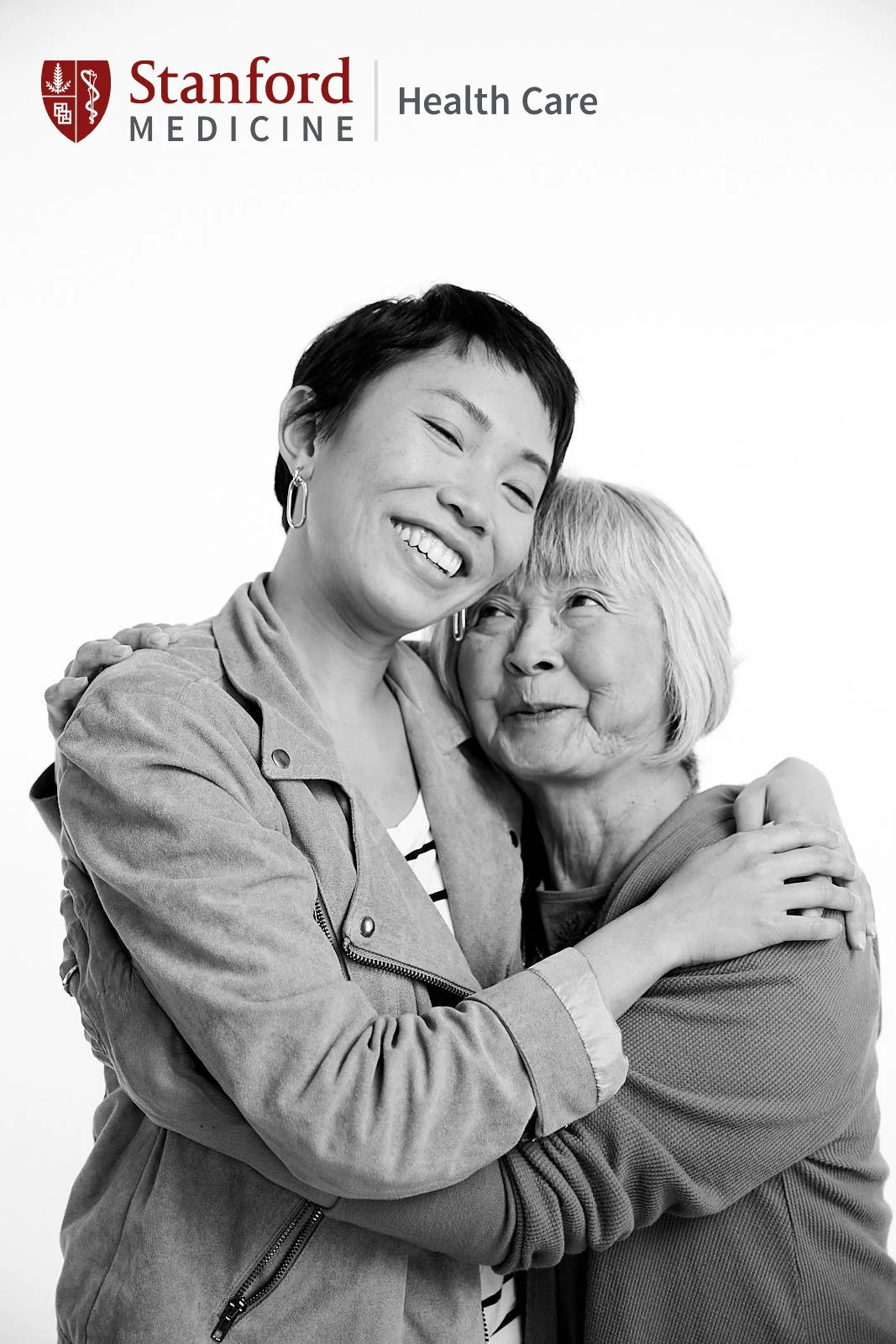 Black and white advertising portrait of two women embracing warmly for a Stanford Medicine Health Care campaign, Bay Area – Marc Olivier Le Blanc Photography