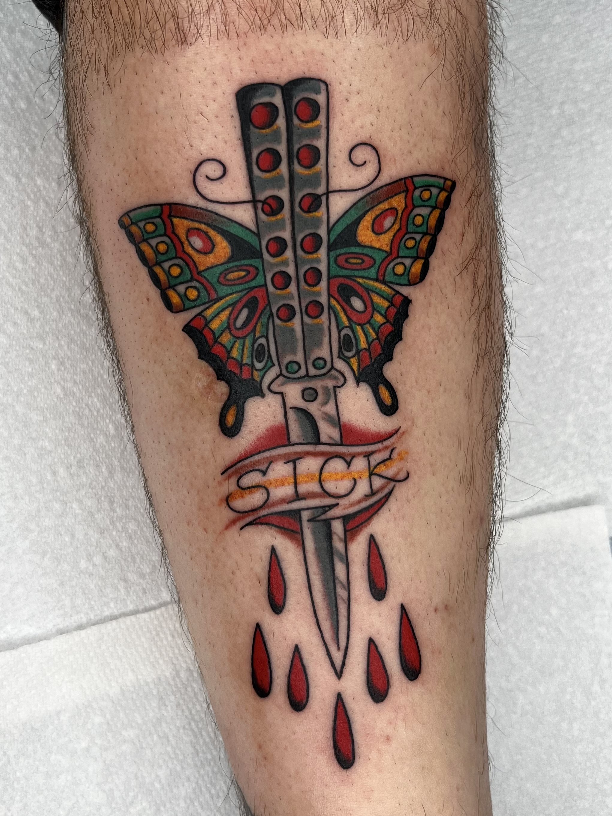 Color Traditional Butterfly Switchblade Tattoo