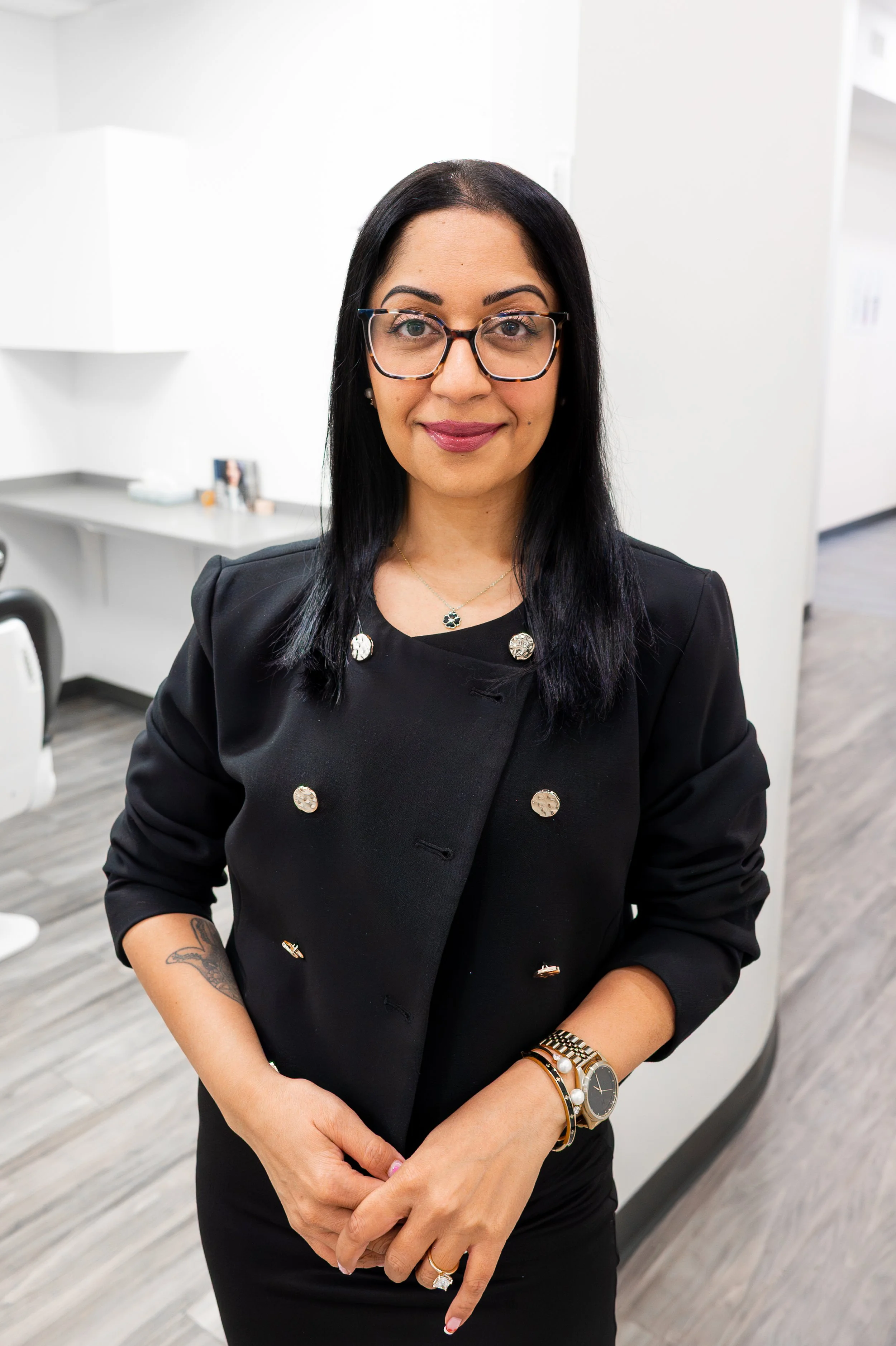Luna Dental team member Pooja at front desk