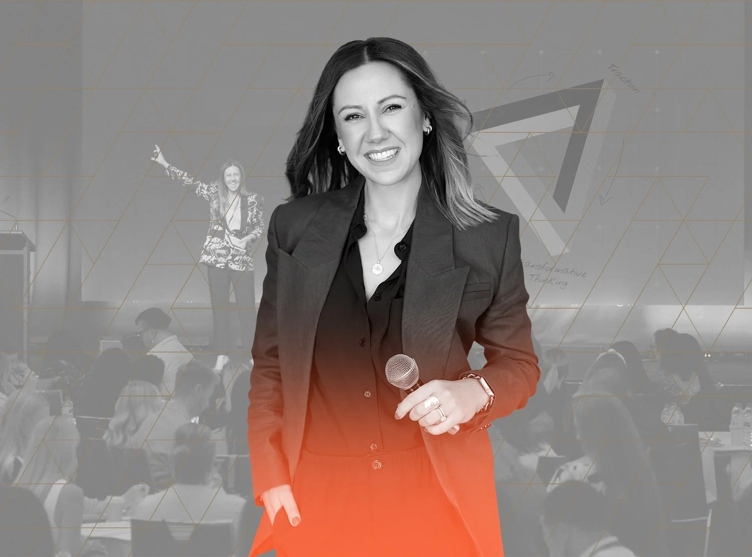 Kate Dillon holding a microphone in front of a large audience during a presentation.
