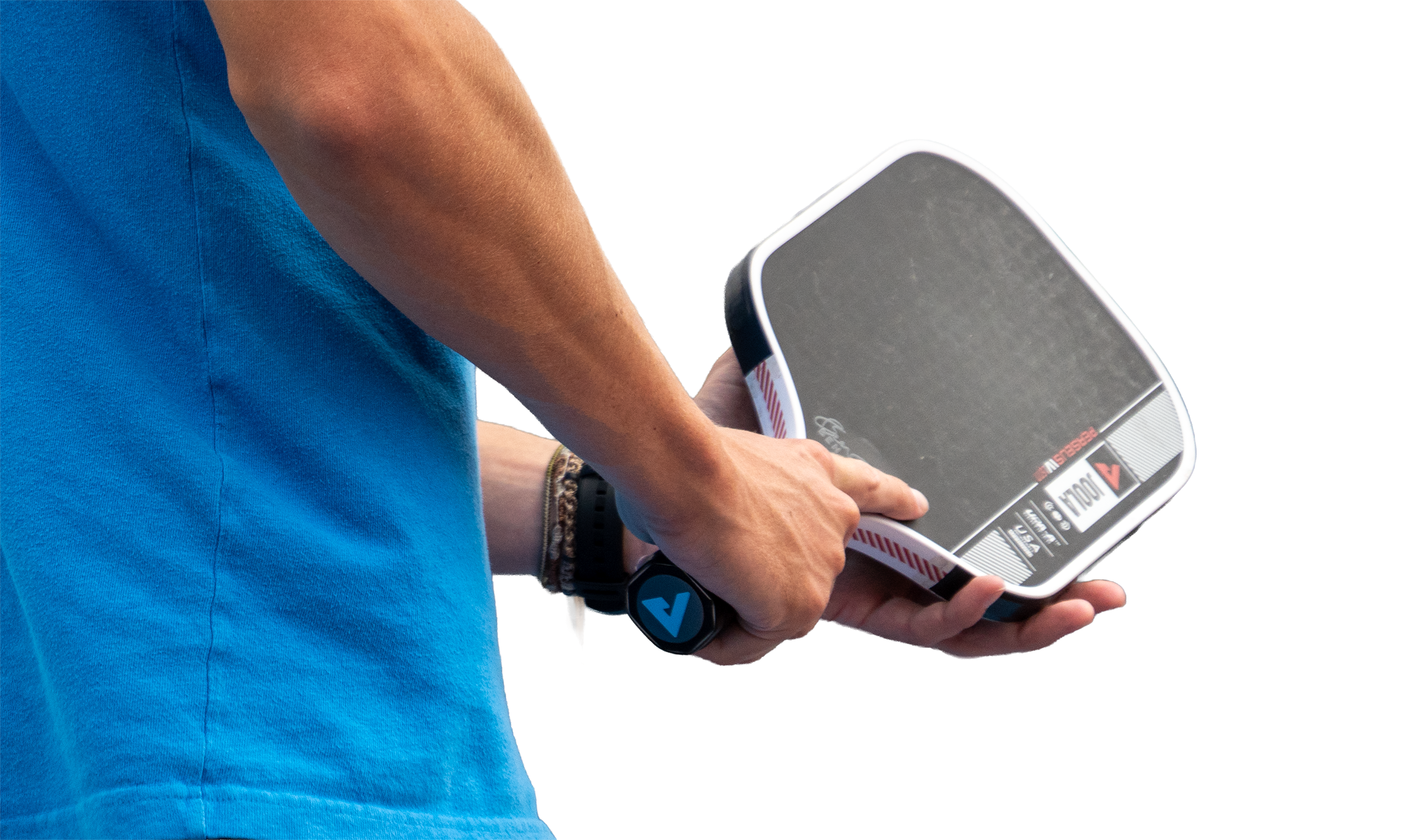 Player holding pickleball paddle
