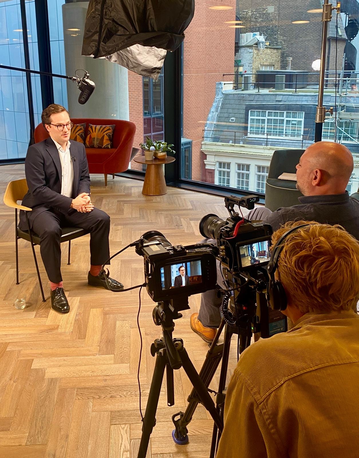 Ian interviewing guest for video in studio