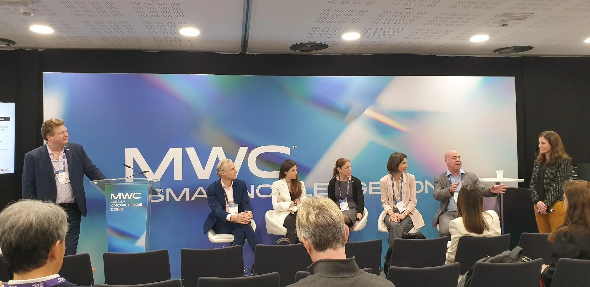 Speakers sitting on panel at Mobile World Congress
