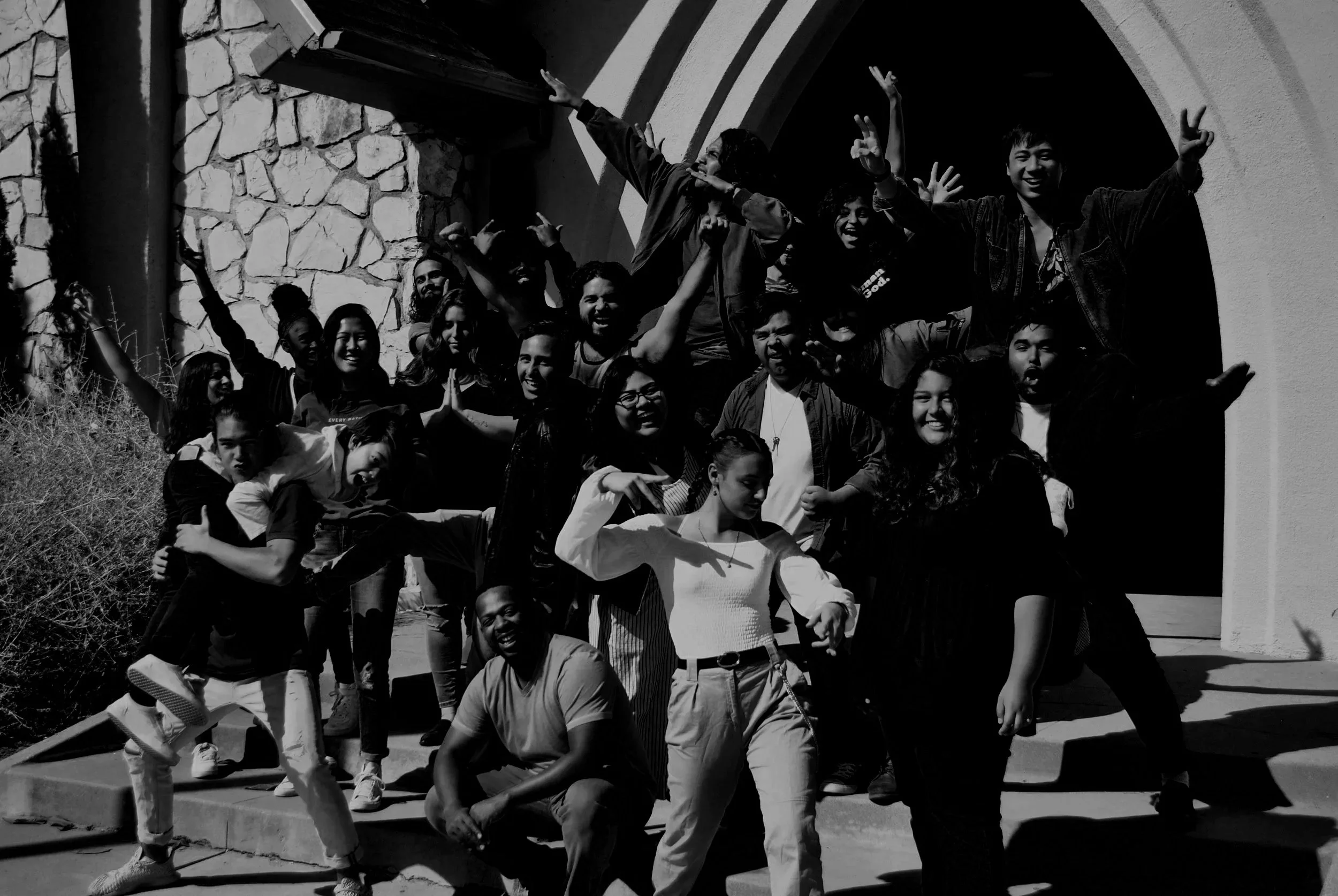 Group of young people posing together—youth leadership, belonging, and community energy.