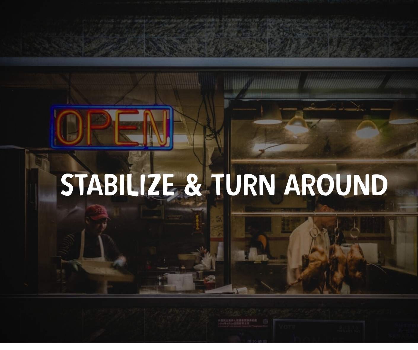 Neon “Open” sign with “Stabilize & Turn Around”—turnaround strategy for small businesses and organizations.
