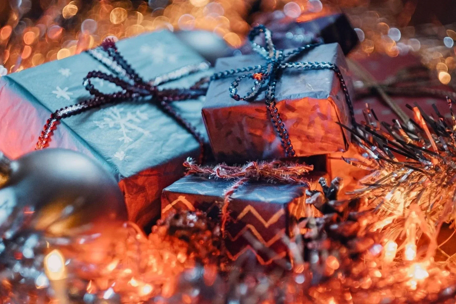 Winter season holiday gift boxes, lights, and ornaments