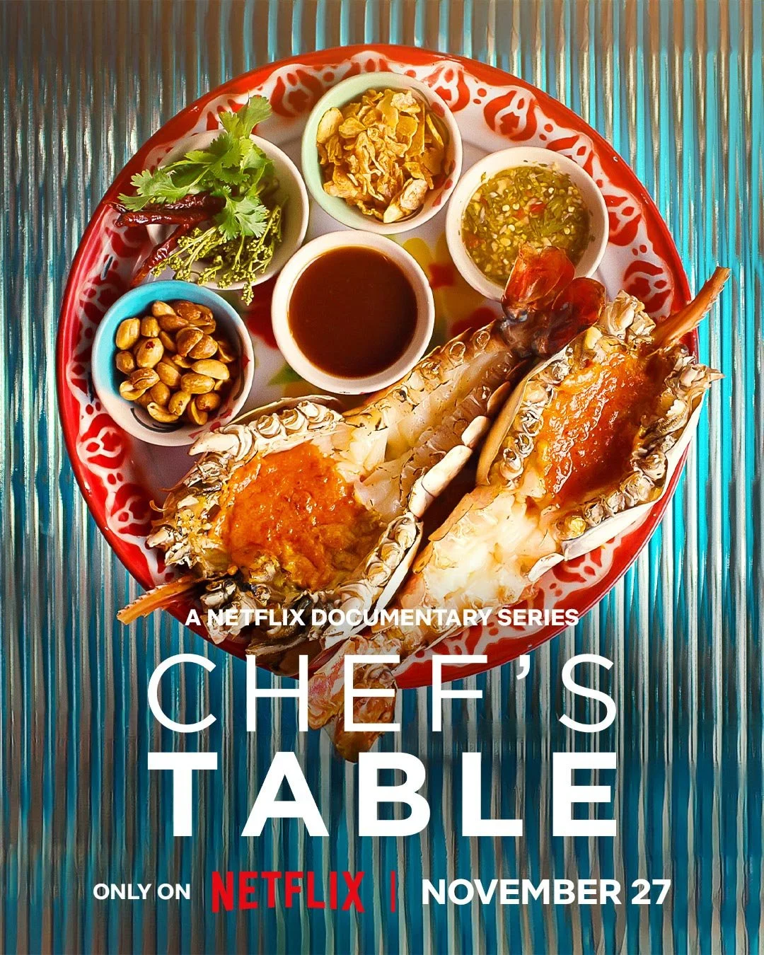 Poster for Netflix documentary series 'Chef's Table' featuring a plate of grilled lobster with dipping sauces, herbs, and garnishes, on a metallic surface.