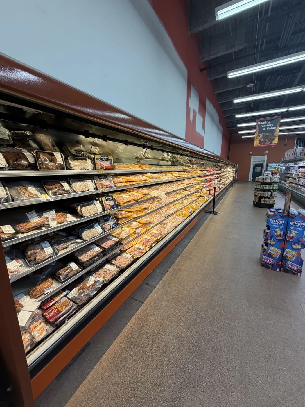 Grocery Store Build-Outs: Lighting, power, refrigerated case and equipment connections.