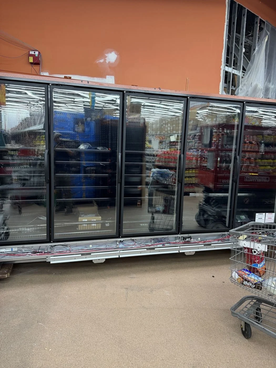 Grocery Store Build-Outs: Lighting, power, refrigerated case and equipment connections.
