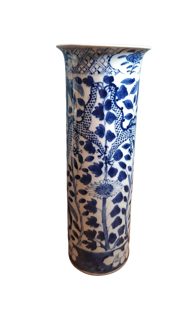 A finely decorated Chinese blue and white porcelain cylinder vase, dating to the late 19th century. The base bears a Kangxi four-character mark.