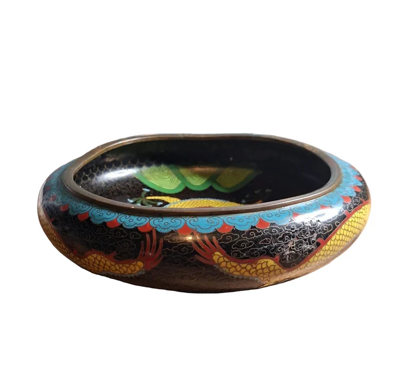 This striking Chinese bowl dates from the early 20th century and showcases the bold artistry of traditional cloisonné enamelling, Available to purchase at Golds Antiques.