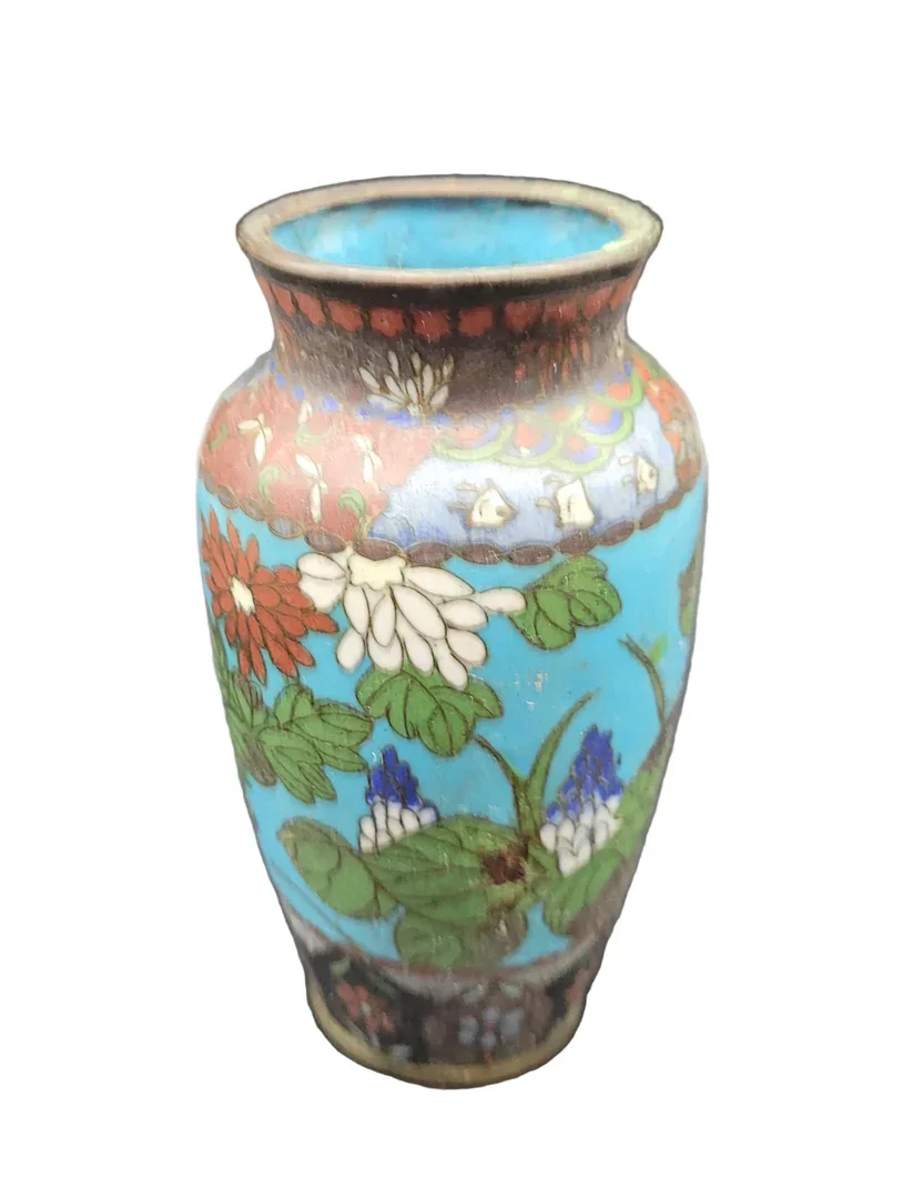 three-piece Japanese cloisonné set, comprising a vase, ginger jar, and bowl.